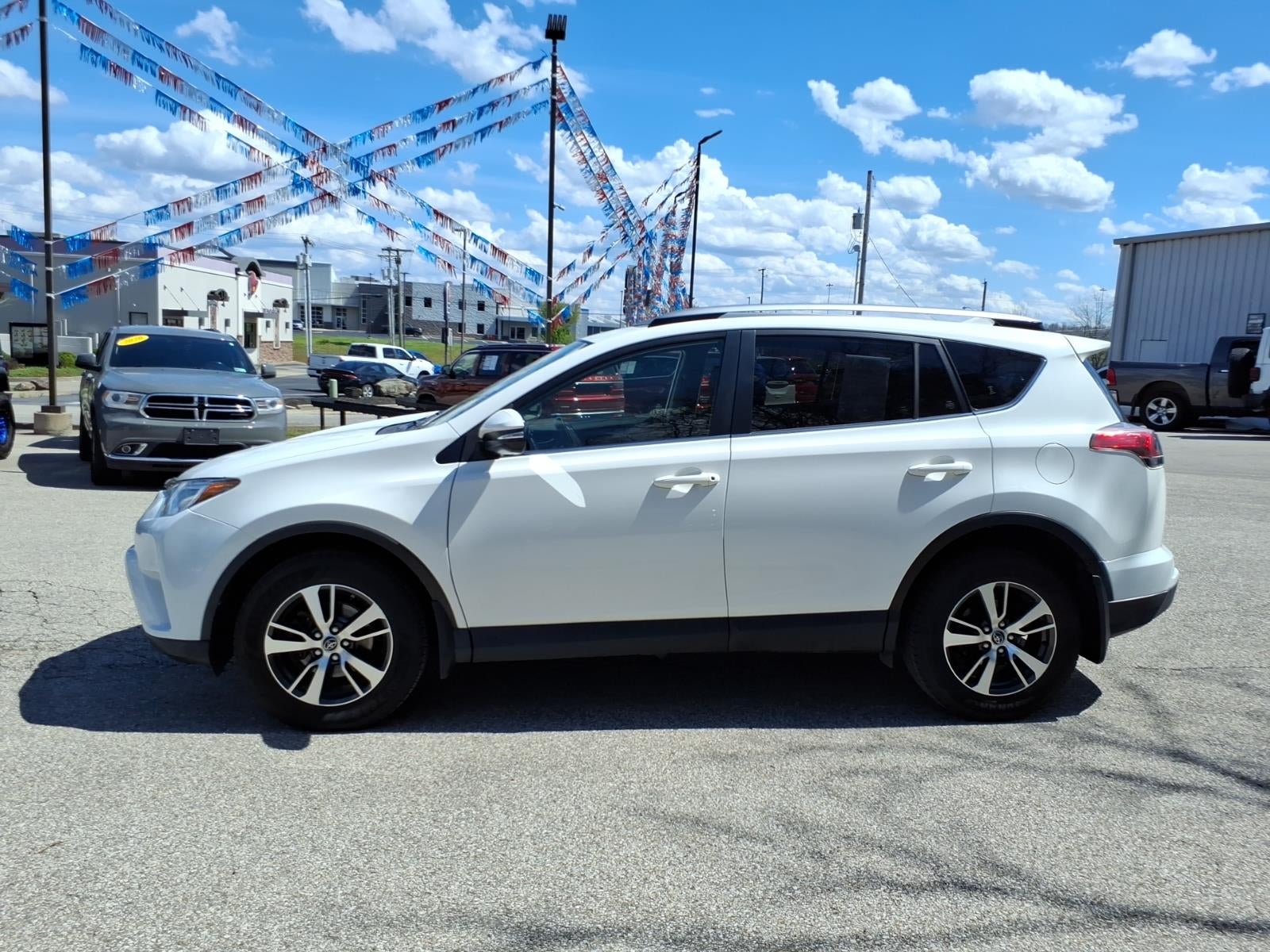 Used 2018 Toyota RAV4 XLE with VIN JTMRFREV0JD230727 for sale in Hurricane, WV